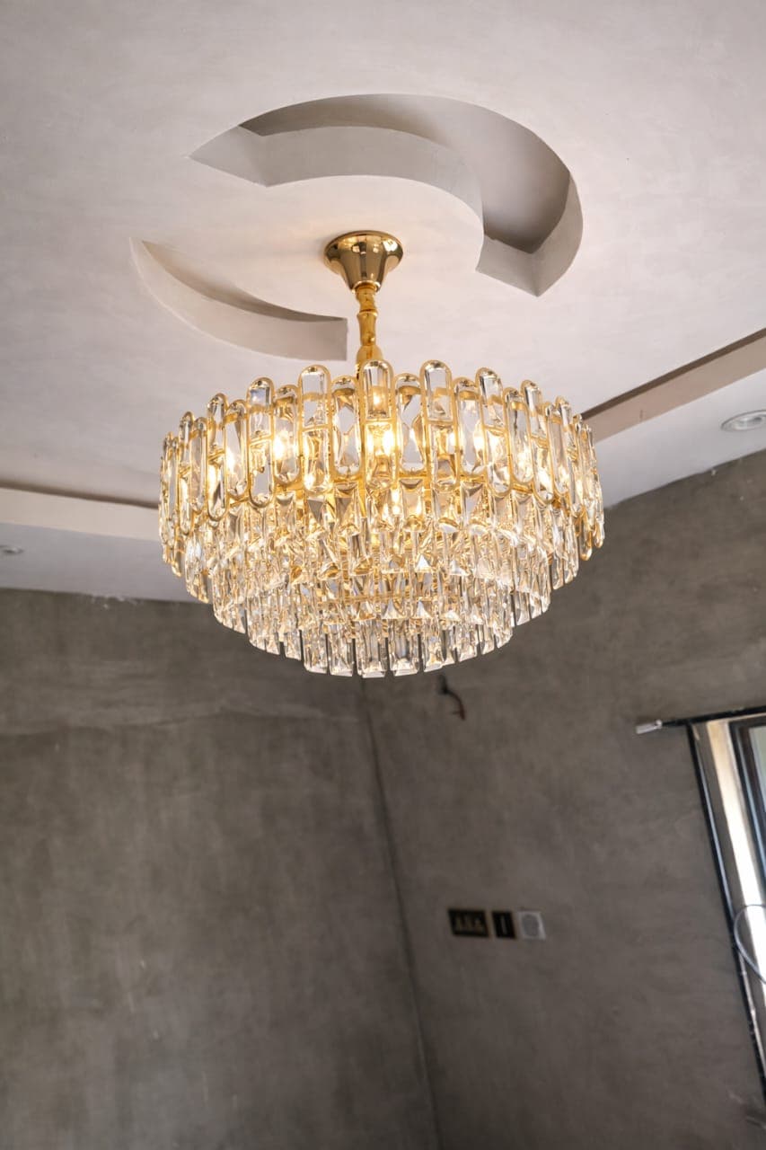Transparent Crystal Chandelier with Gold Light Reflection | Modern Luxury Ceiling Light for Dining & Living Room. view 2